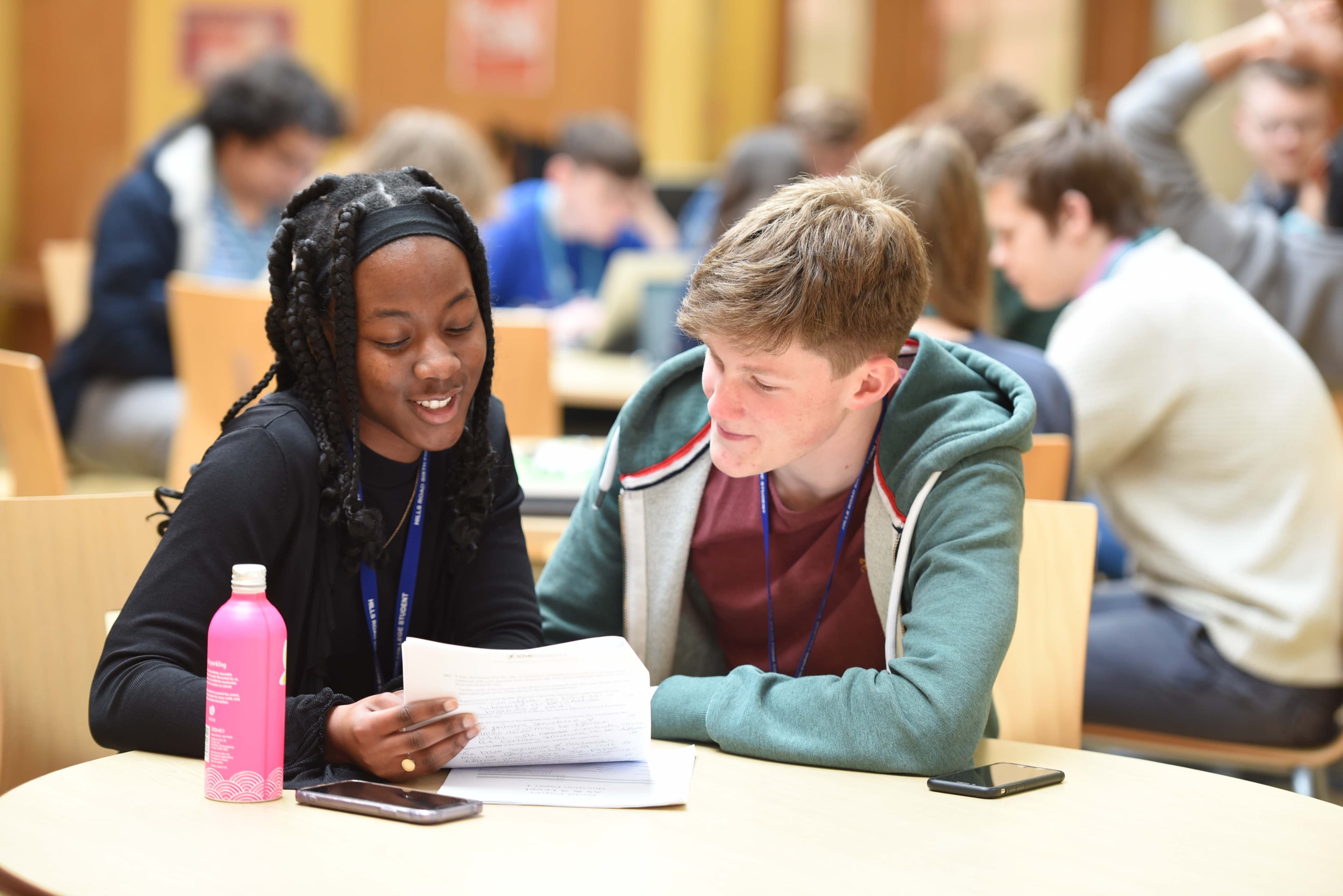 Students discussing work
