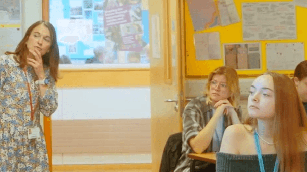 Teacher presenting to a class