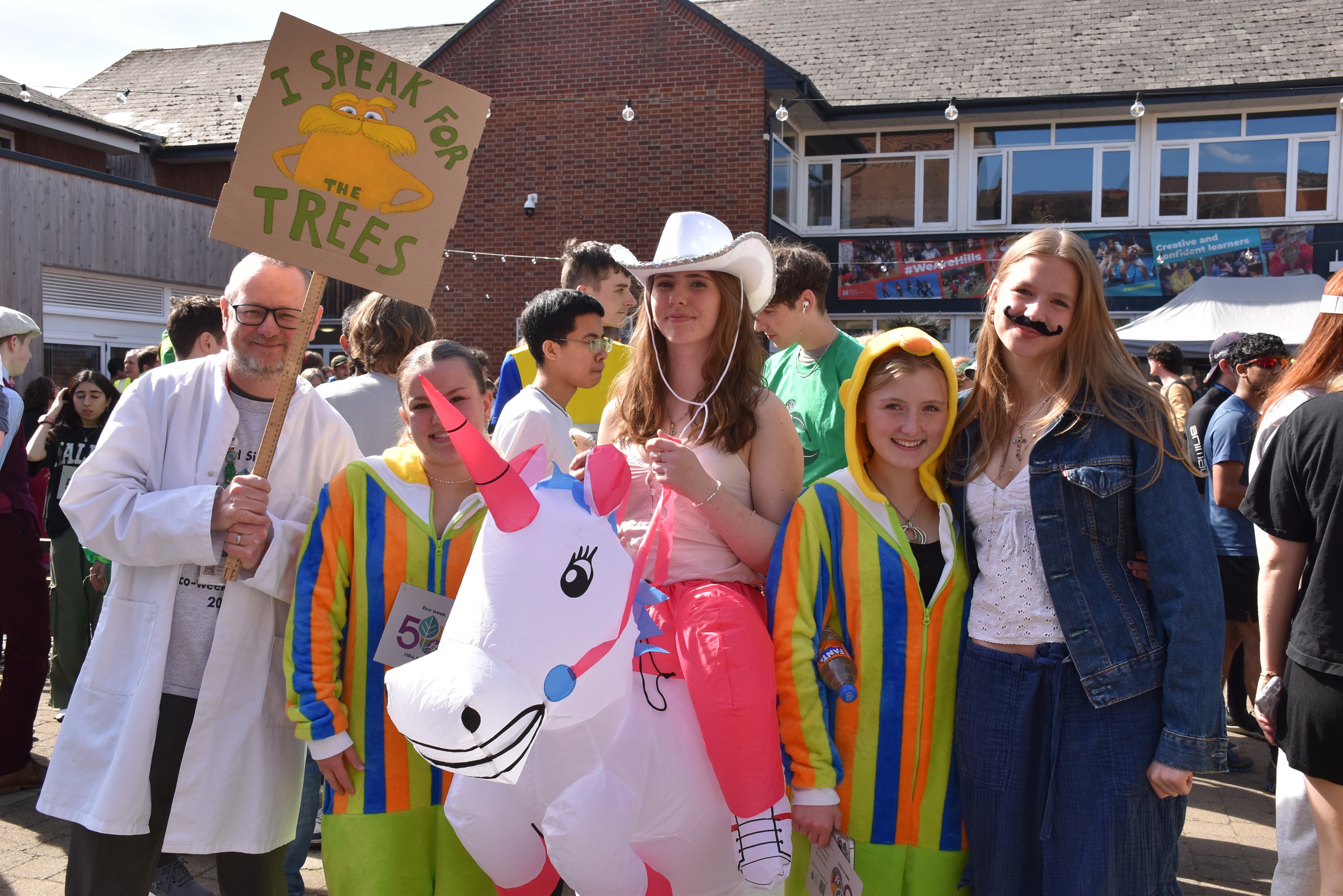 students and teachers dressed up for HR 4.5 fun run 2025