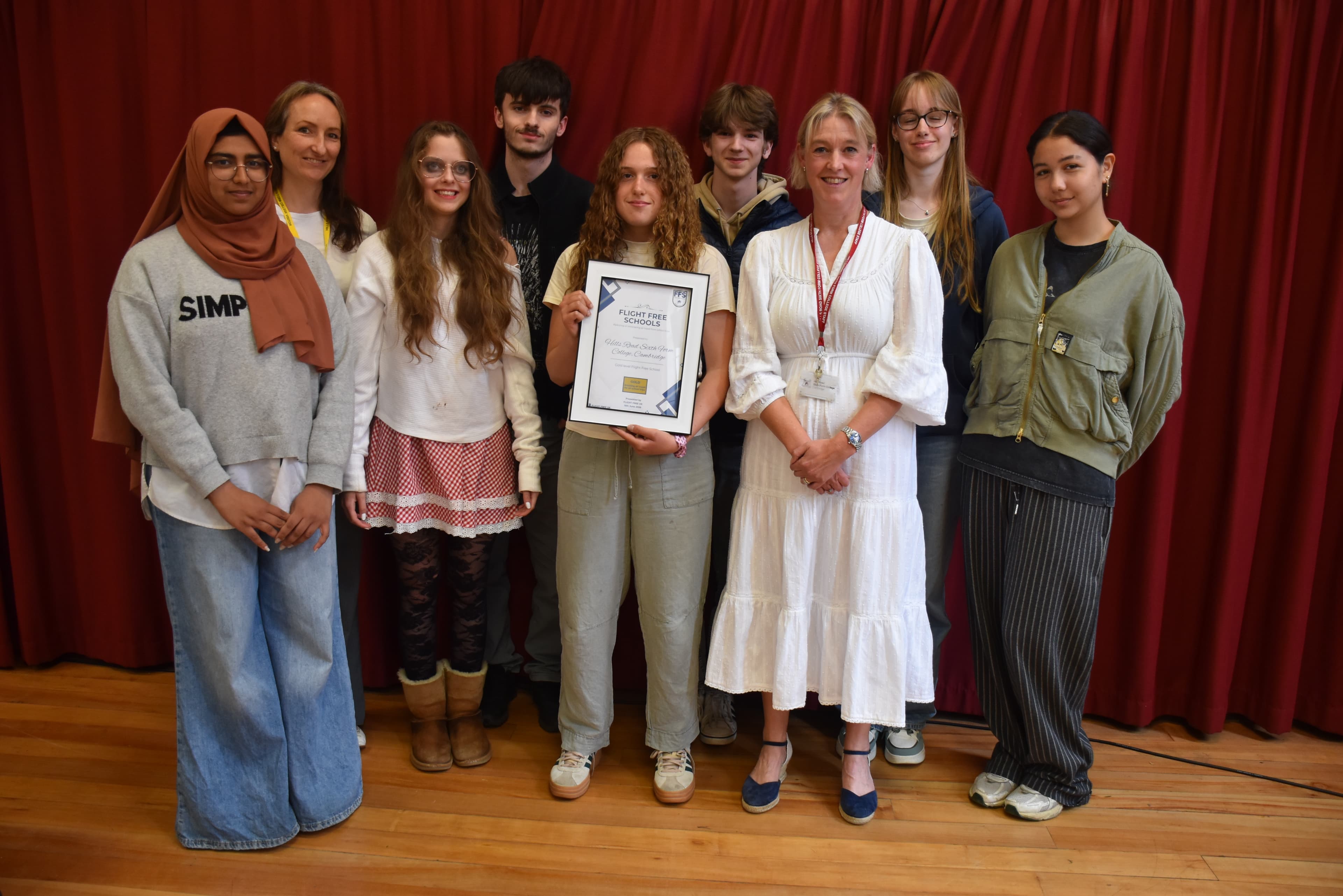 Hills Road studentswith Anna Hughes of Flight Free UK (second from left) and Principal Jo Trump (third from right)
