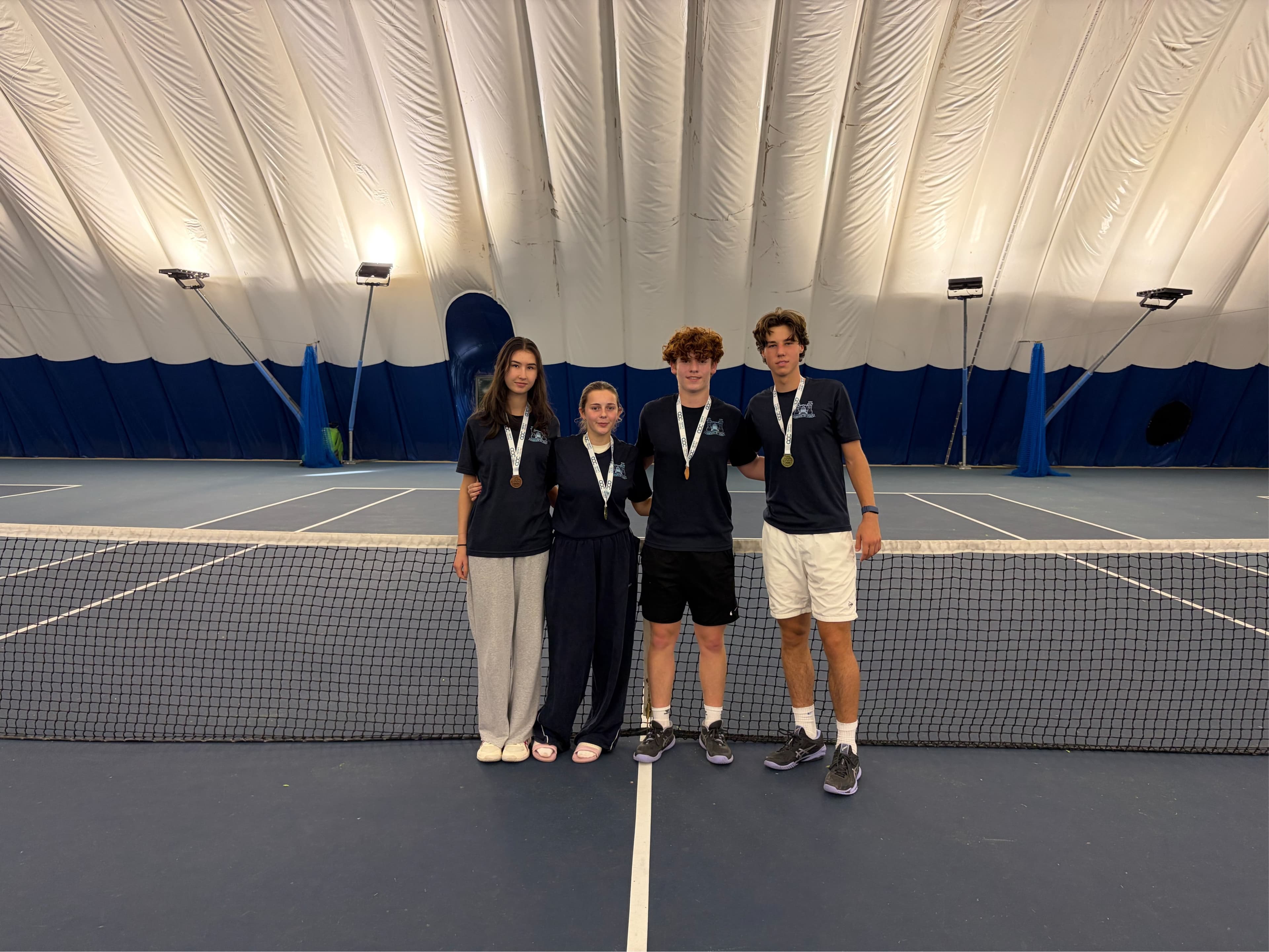 Tennis students medals Oct 2026