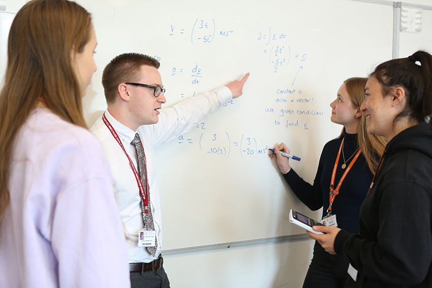 Students discussing maths
