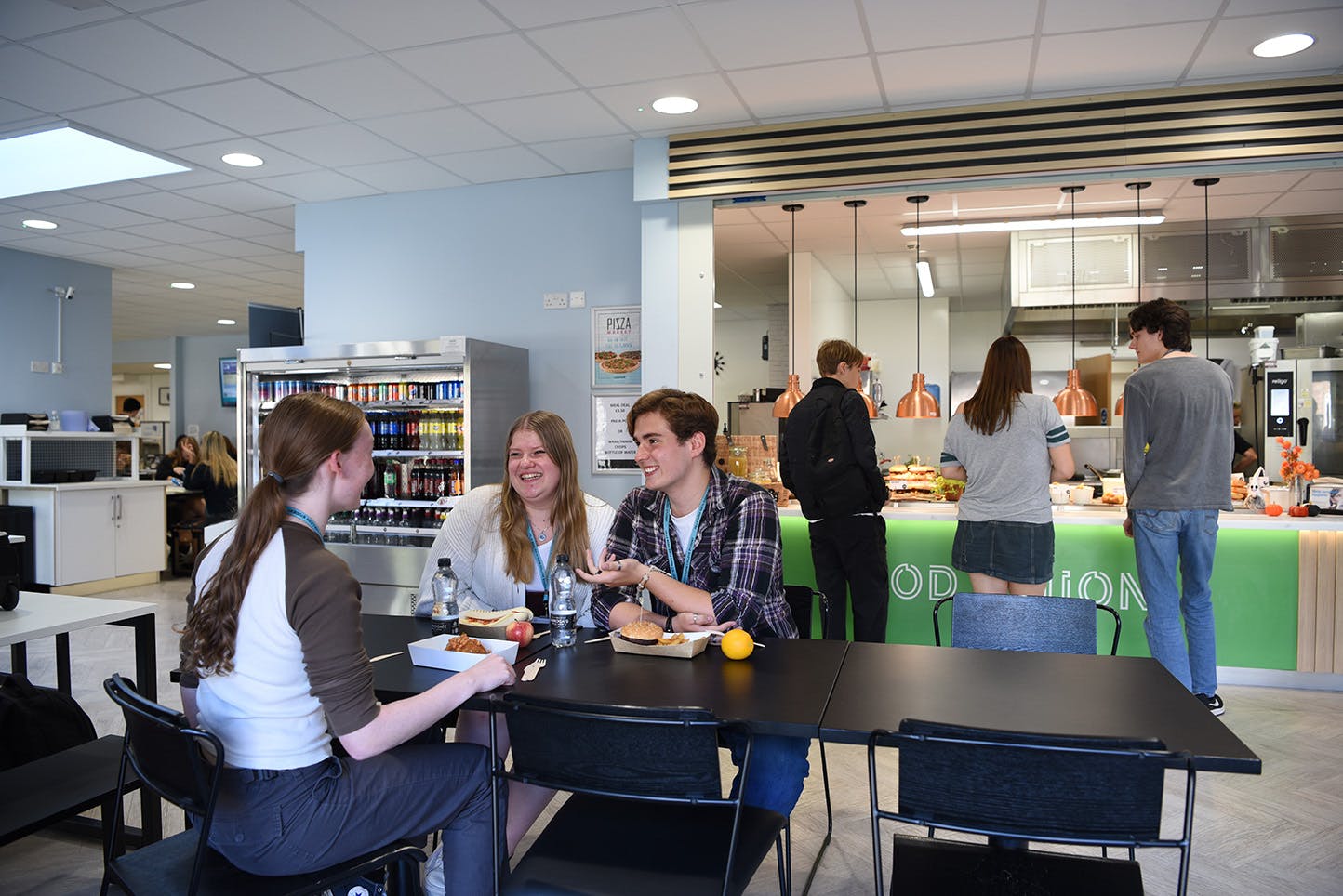 Students relaxing in the cafe