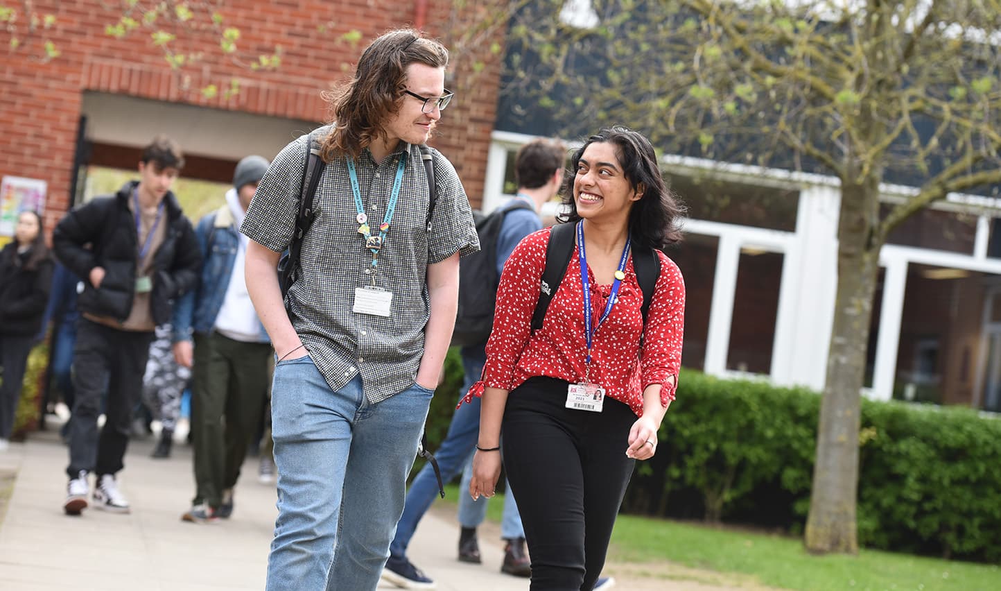 Two students walking together